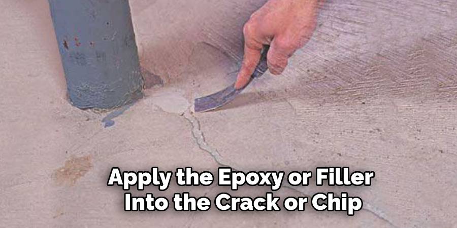 Apply the Epoxy or Filler 
Into the Crack or Chip
