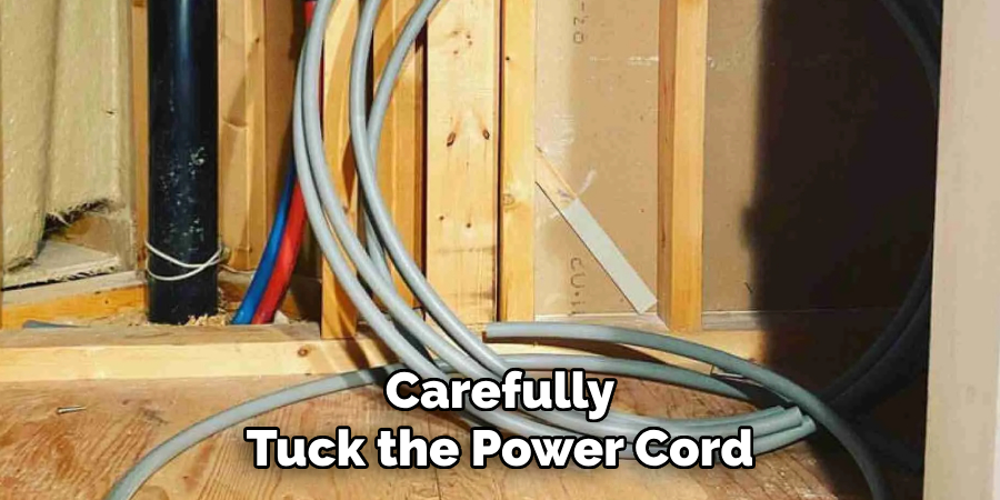 Carefully Tuck the Power Cord