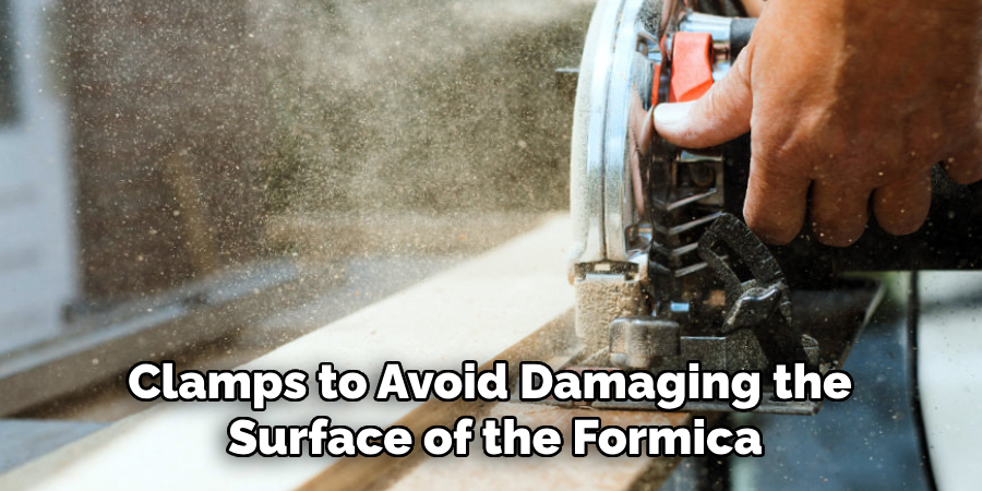 Clamps to Avoid Damaging the 
Surface of the Formica