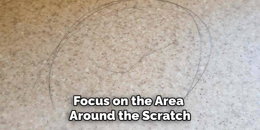 Focus on the Area
Around the Scratch
