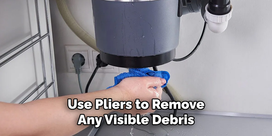 Use Pliers to Remove Any Visible Debris