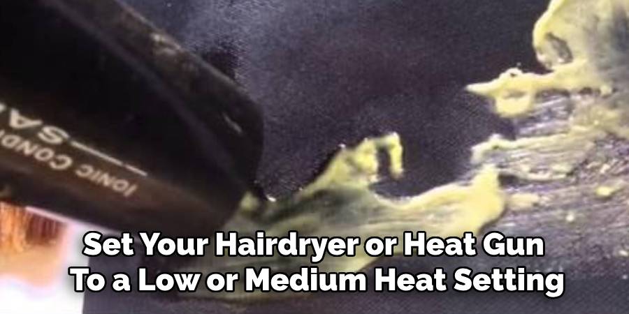 Set Your Hairdryer or Heat Gun
To a Low or Medium Heat Setting