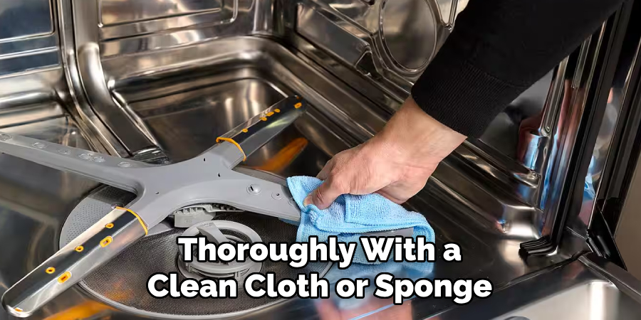 Thoroughly With a
Clean Cloth or Sponge