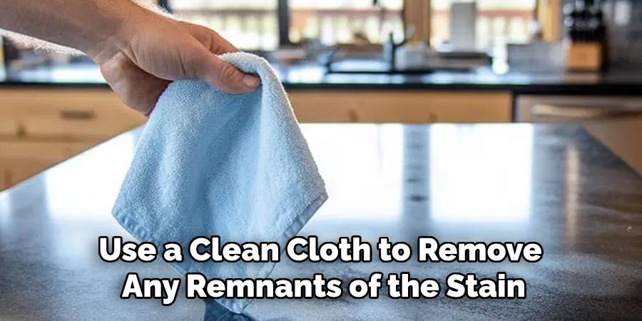 Use a Clean Cloth to Remove 
Any Remnants of the Stain