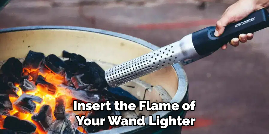 Insert the Flame of 
Your Wand Lighter