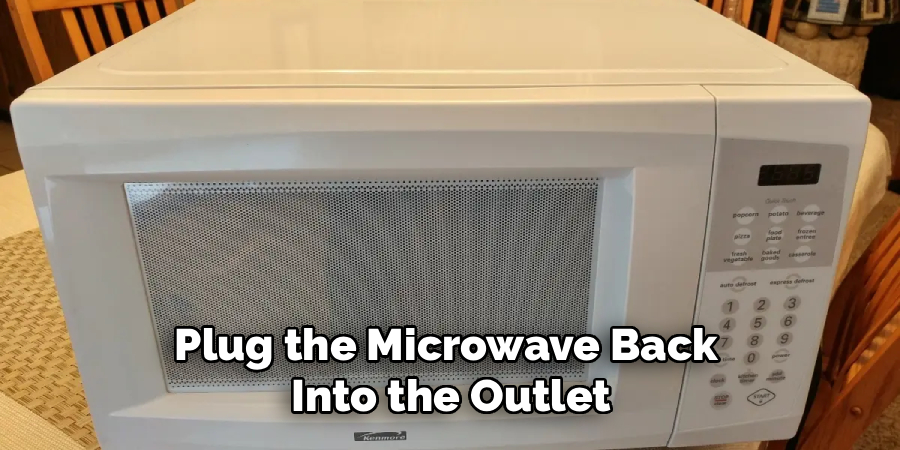 Plug the Microwave Back 
Into the Outlet